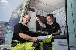 Kranarbeiten Dachau auf Baustelle mit Hebevorgang